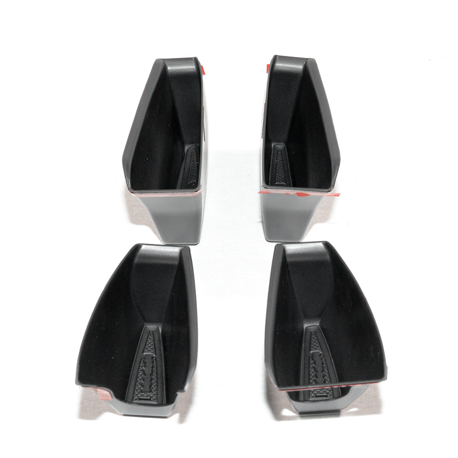 Tesla Model Y – door-handle storage trays